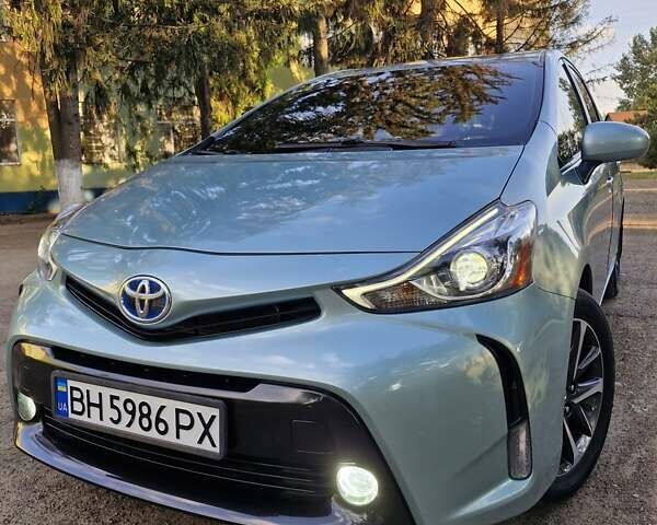 Зеленый Тойота Prius v, объемом двигателя 1.8 л и пробегом 161 тыс. км за 18500 $, фото 1 на Automoto.ua