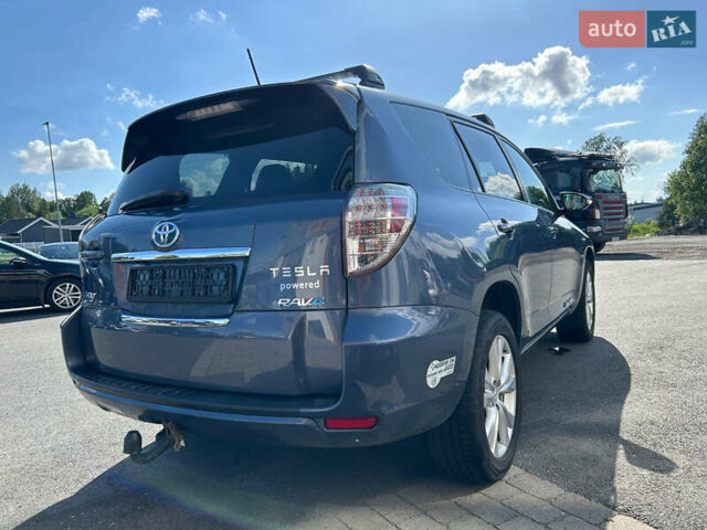 Синий Тойота RAV4 EV, объемом двигателя 0 л и пробегом 120 тыс. км за 13500 $, фото 1 на Automoto.ua