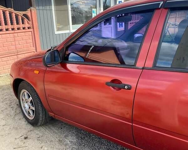 Красный ВАЗ 1117 Калина, объемом двигателя 1.6 л и пробегом 219 тыс. км за 1900 $, фото 1 на Automoto.ua