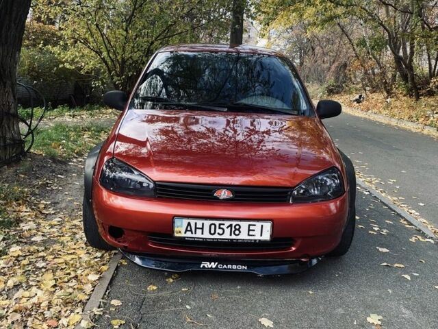 Красный ВАЗ 1119 Калина, объемом двигателя 1.4 л и пробегом 170 тыс. км за 1700 $, фото 1 на Automoto.ua