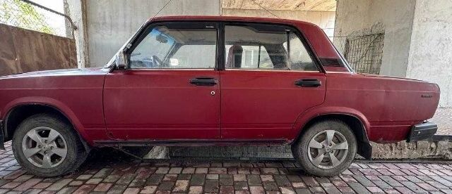 Красный ВАЗ 2107, объемом двигателя 1 л и пробегом 2 тыс. км за 264 $, фото 1 на Automoto.ua