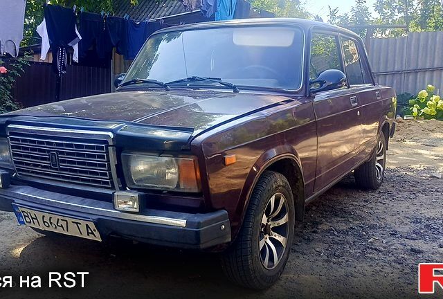 Красный ВАЗ 2107, объемом двигателя 1.5 л и пробегом 220 тыс. км за 1050 $, фото 1 на Automoto.ua