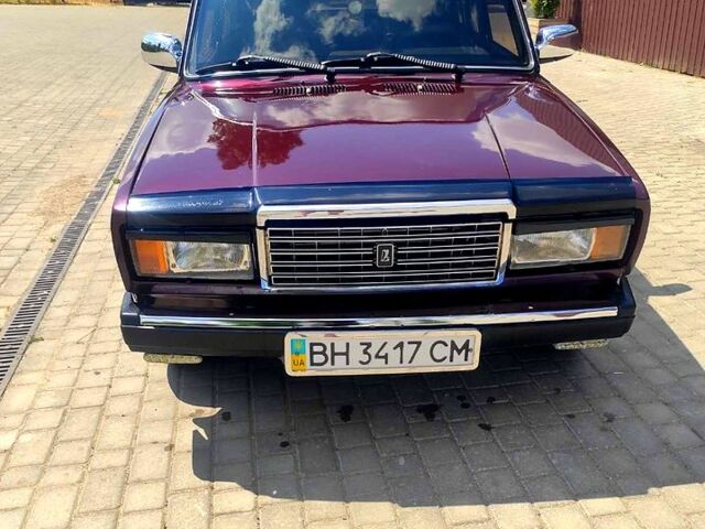 Красный ВАЗ 2107, объемом двигателя 1.5 л и пробегом 150 тыс. км за 1200 $, фото 1 на Automoto.ua