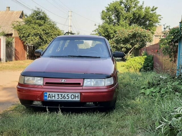 Красный ВАЗ 2111, объемом двигателя 1.5 л и пробегом 400 тыс. км за 1004 $, фото 1 на Automoto.ua