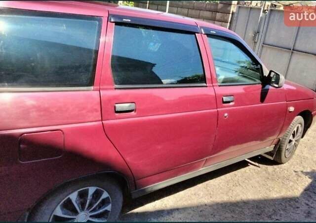 Красный ВАЗ 2111, объемом двигателя 1.5 л и пробегом 255 тыс. км за 2400 $, фото 1 на Automoto.ua