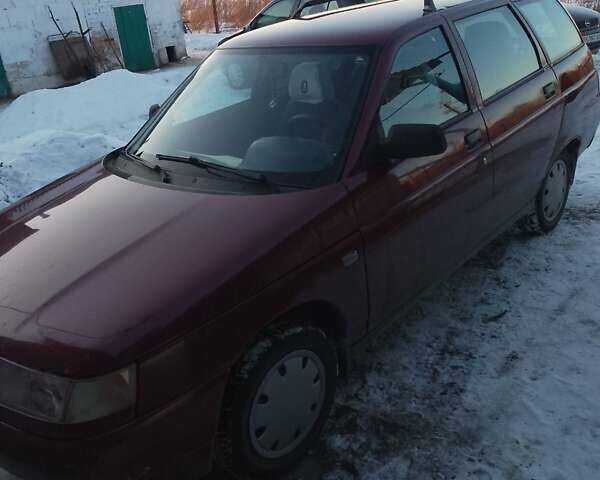 Красный ВАЗ 2111, объемом двигателя 1.5 л и пробегом 122 тыс. км за 2150 $, фото 1 на Automoto.ua