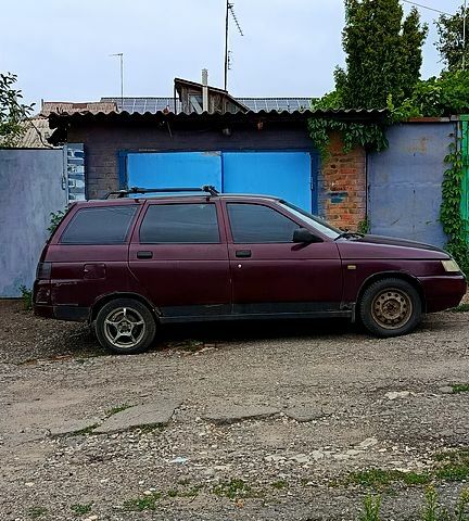 Красный ВАЗ 2111, объемом двигателя 1.6 л и пробегом 200 тыс. км за 1100 $, фото 1 на Automoto.ua