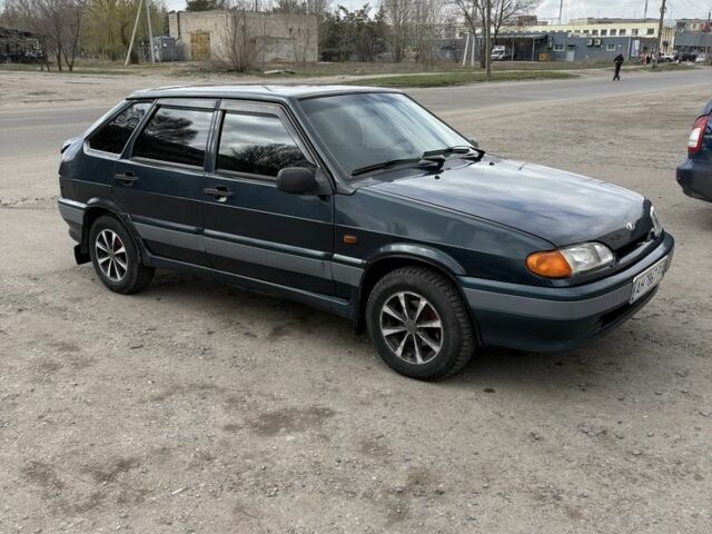 Зеленый ВАЗ 2111, объемом двигателя 1.5 л и пробегом 236 тыс. км за 2400 $, фото 1 на Automoto.ua