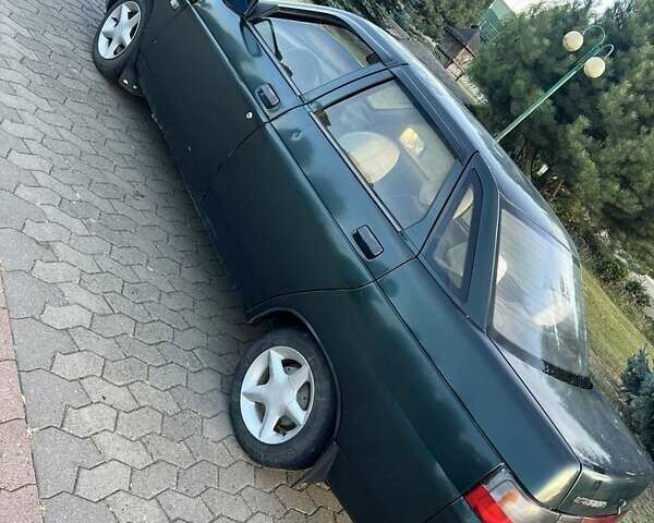 Зеленый ВАЗ 2111, объемом двигателя 1.5 л и пробегом 250 тыс. км за 850 $, фото 1 на Automoto.ua