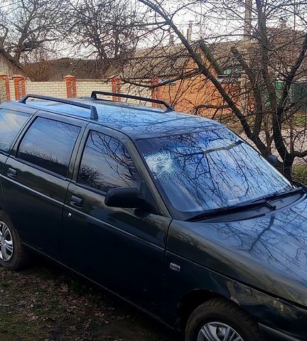 Зеленый ВАЗ 2111, объемом двигателя 16 л и пробегом 300 тыс. км за 1200 $, фото 1 на Automoto.ua