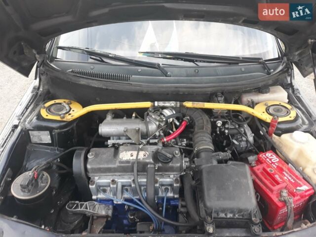 Чорний ВАЗ 2112, об'ємом двигуна 1.5 л та пробігом 572 тис. км за 1700 $, фото 1 на Automoto.ua