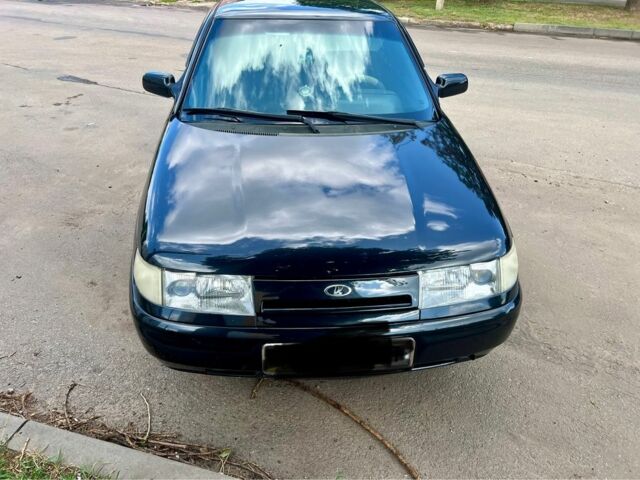 Черный ВАЗ 2112, объемом двигателя 1.6 л и пробегом 230 тыс. км за 3050 $, фото 1 на Automoto.ua