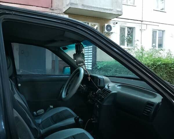 Черный ВАЗ 2112, объемом двигателя 1.6 л и пробегом 300 тыс. км за 1800 $, фото 1 на Automoto.ua