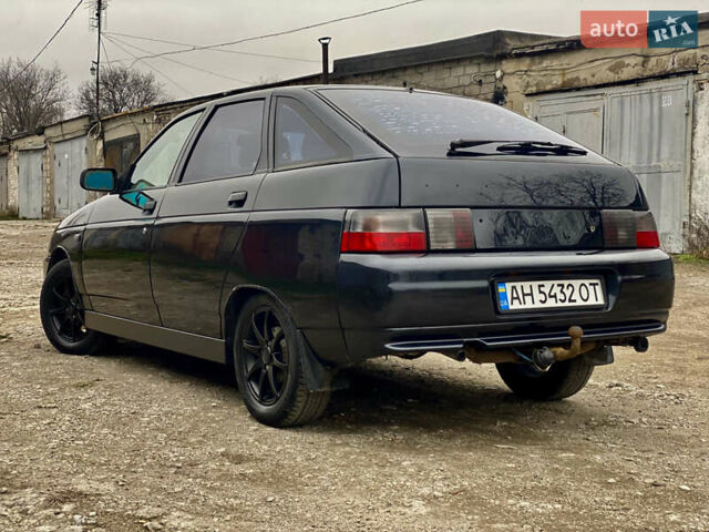 Чорний ВАЗ 2112, об'ємом двигуна 1.6 л та пробігом 250 тис. км за 1999 $, фото 1 на Automoto.ua