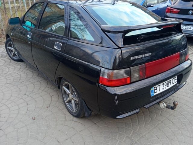 Черный ВАЗ 2112, объемом двигателя 1.6 л и пробегом 228 тыс. км за 800 $, фото 1 на Automoto.ua