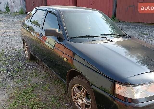 Черный ВАЗ 2112, объемом двигателя 1.6 л и пробегом 170 тыс. км за 1964 $, фото 1 на Automoto.ua