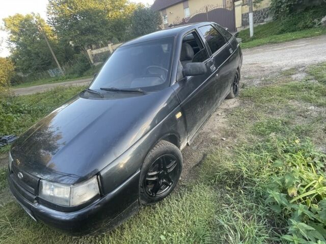 Черный ВАЗ 2112, объемом двигателя 2 л и пробегом 200 тыс. км за 628 $, фото 1 на Automoto.ua
