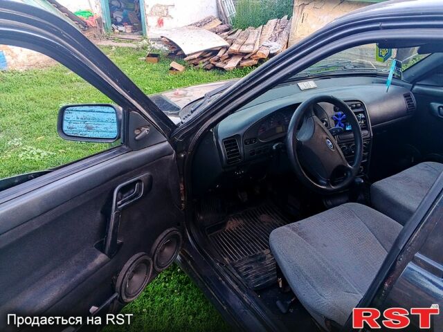 Черный ВАЗ 2112, объемом двигателя 1.6 л и пробегом 0 тыс. км за 2700 $, фото 1 на Automoto.ua