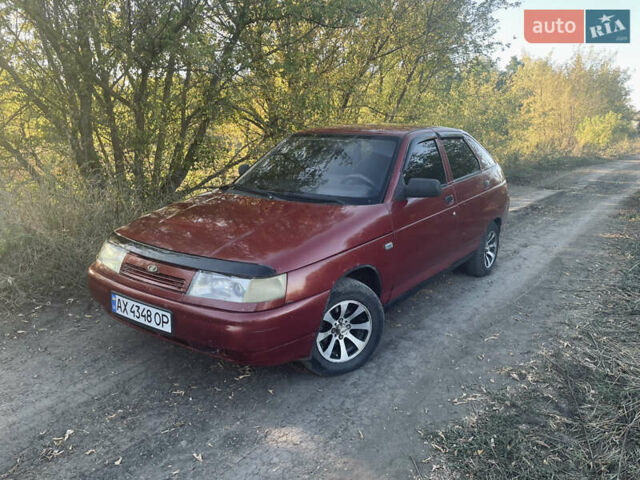 Красный ВАЗ 2112, объемом двигателя 1.6 л и пробегом 277 тыс. км за 1499 $, фото 1 на Automoto.ua