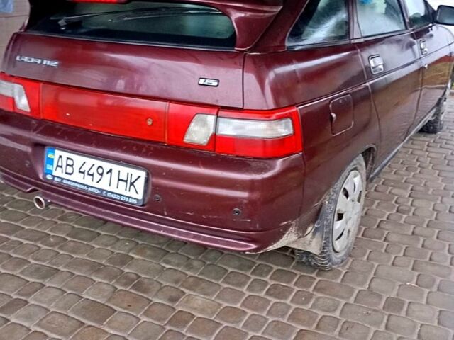 Красный ВАЗ 2112, объемом двигателя 1.6 л и пробегом 186 тыс. км за 1800 $, фото 1 на Automoto.ua