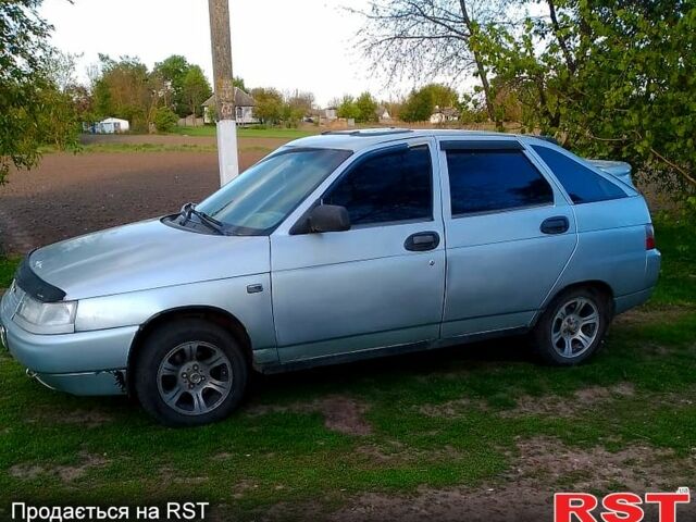 Серый ВАЗ 2112, объемом двигателя 1.5 л и пробегом 250 тыс. км за 1200 $, фото 1 на Automoto.ua