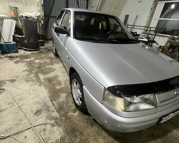 Серый ВАЗ 2112, объемом двигателя 1.5 л и пробегом 200 тыс. км за 1500 $, фото 1 на Automoto.ua