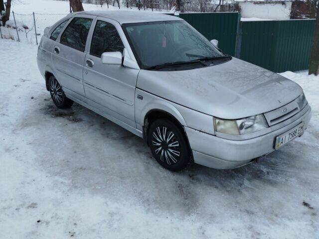 Серый ВАЗ 2112, объемом двигателя 1.5 л и пробегом 250 тыс. км за 1600 $, фото 1 на Automoto.ua