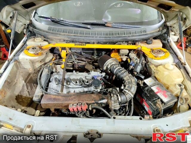 Серый ВАЗ 2112, объемом двигателя 1.6 л и пробегом 283 тыс. км за 1000 $, фото 1 на Automoto.ua