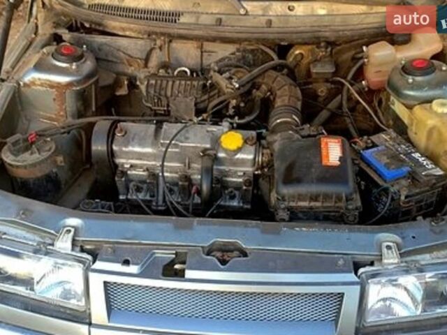 Серый ВАЗ 2112, объемом двигателя 1.5 л и пробегом 408 тыс. км за 2300 $, фото 1 на Automoto.ua