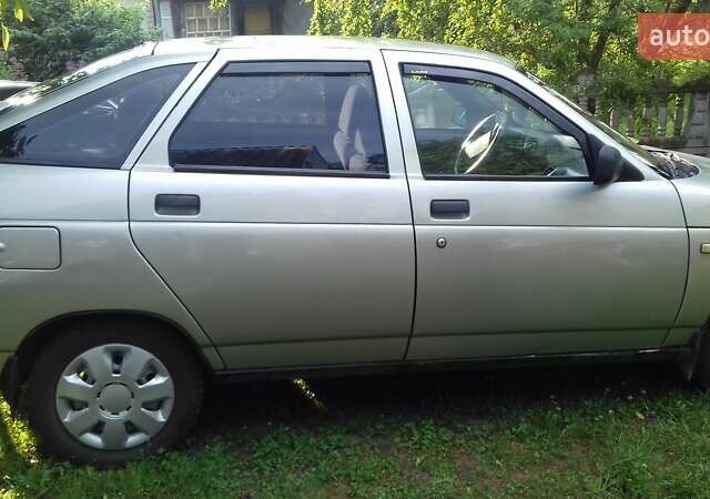 Серый ВАЗ 2112, объемом двигателя 1.5 л и пробегом 175 тыс. км за 2000 $, фото 1 на Automoto.ua