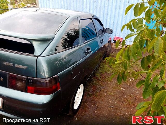 Серый ВАЗ 2112, объемом двигателя 1.6 л и пробегом 200 тыс. км за 1700 $, фото 1 на Automoto.ua