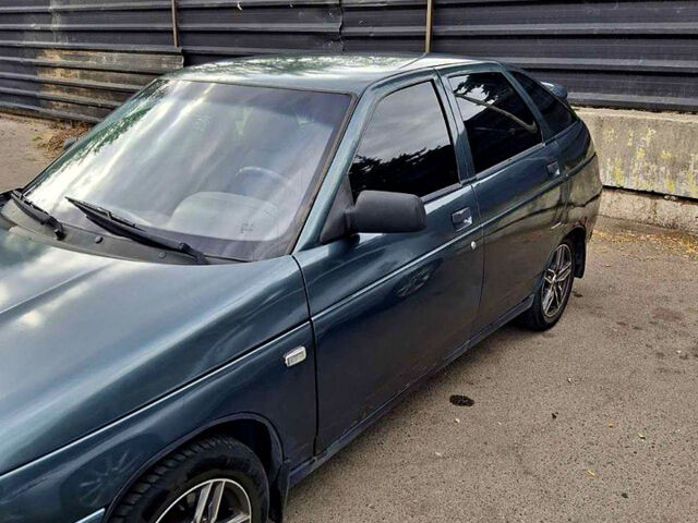 Серый ВАЗ 2112, объемом двигателя 1.6 л и пробегом 250 тыс. км за 1500 $, фото 1 на Automoto.ua