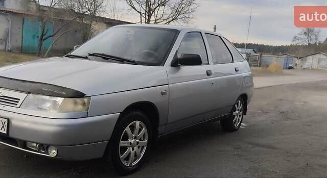 Серый ВАЗ 2112, объемом двигателя 1.6 л и пробегом 223 тыс. км за 2099 $, фото 1 на Automoto.ua