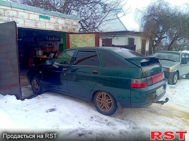 Зеленый ВАЗ 2112, объемом двигателя 1.5 л и пробегом 203 тыс. км за 1800 $, фото 1 на Automoto.ua