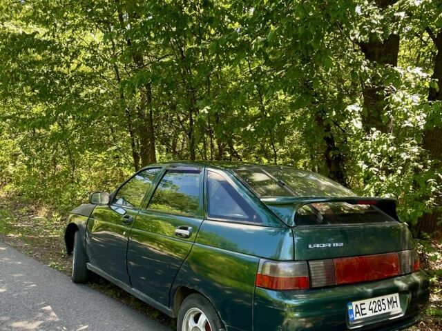 Зеленый ВАЗ 2112, объемом двигателя 1.5 л и пробегом 211 тыс. км за 1258 $, фото 1 на Automoto.ua