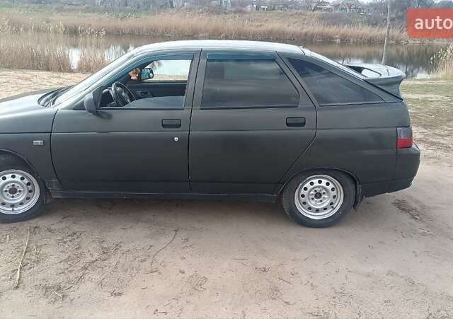 Зеленый ВАЗ 2112, объемом двигателя 1.6 л и пробегом 206 тыс. км за 2000 $, фото 1 на Automoto.ua