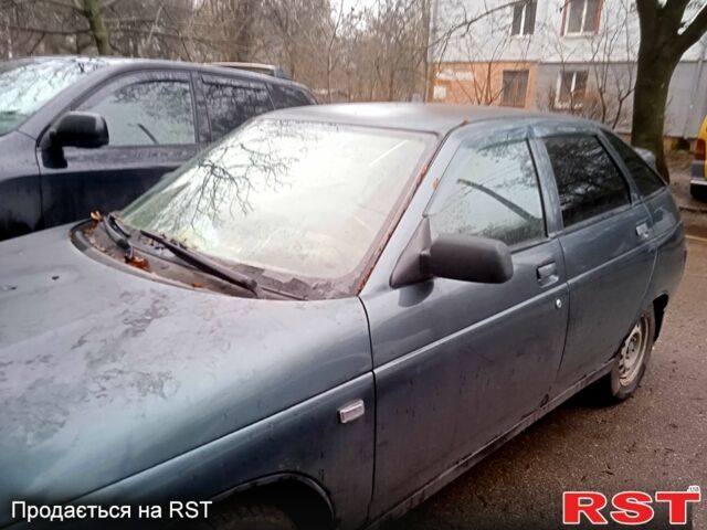 Зеленый ВАЗ 2112, объемом двигателя 1.6 л и пробегом 250 тыс. км за 1500 $, фото 1 на Automoto.ua