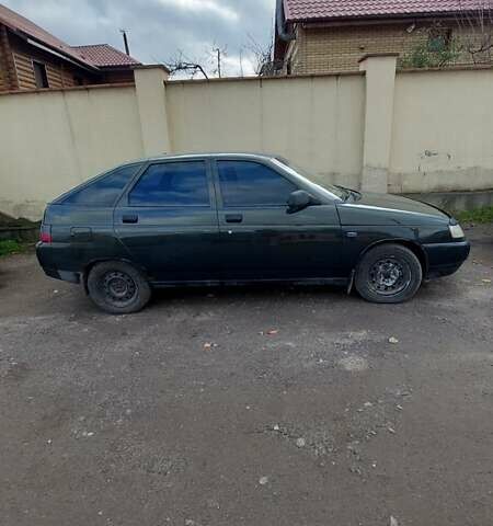 Зеленый ВАЗ 2112, объемом двигателя 1.6 л и пробегом 212 тыс. км за 2200 $, фото 1 на Automoto.ua