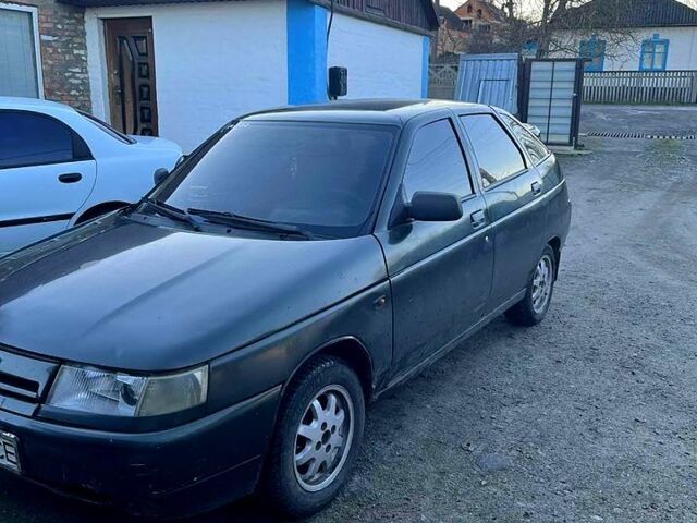 Зеленый ВАЗ 2112, объемом двигателя 1.5 л и пробегом 120 тыс. км за 1200 $, фото 1 на Automoto.ua