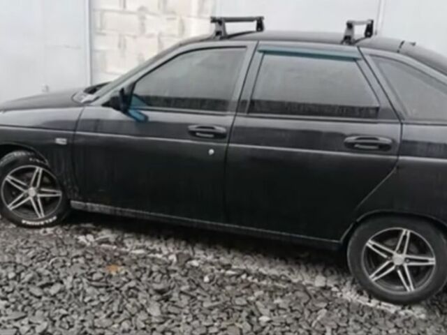 Чорний ВАЗ 21124, об'ємом двигуна 1.6 л та пробігом 245 тис. км за 1999 $, фото 1 на Automoto.ua