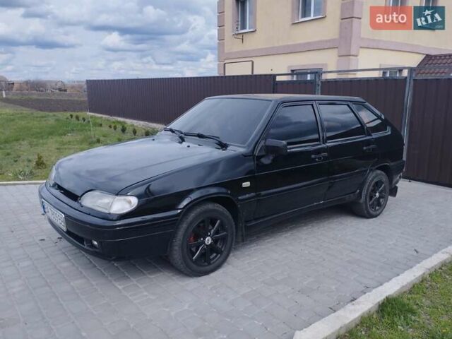 Черный ВАЗ 2114 Самара, объемом двигателя 1.5 л и пробегом 321 тыс. км за 2100 $, фото 1 на Automoto.ua