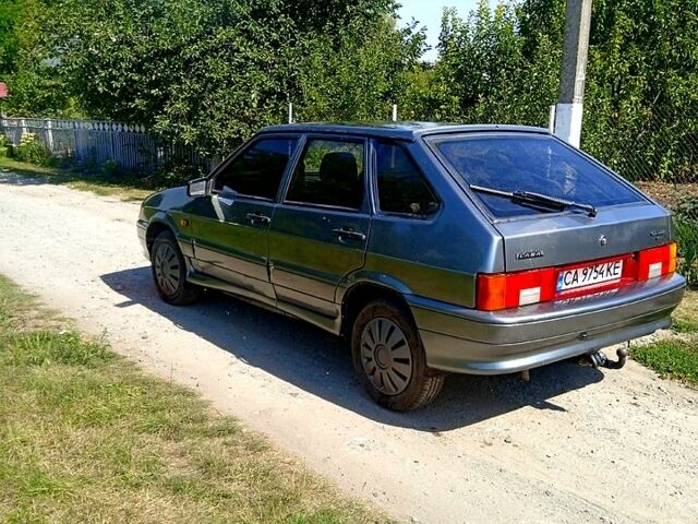 Серый ВАЗ 2114 Самара, объемом двигателя 1.5 л и пробегом 250 тыс. км за 1400 $, фото 1 на Automoto.ua