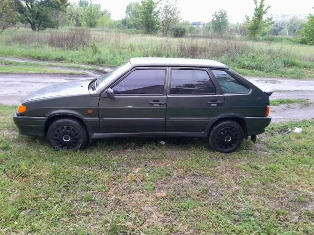 Зеленый ВАЗ 2114 Самара, объемом двигателя 1.5 л и пробегом 190 тыс. км за 2000 $, фото 1 на Automoto.ua