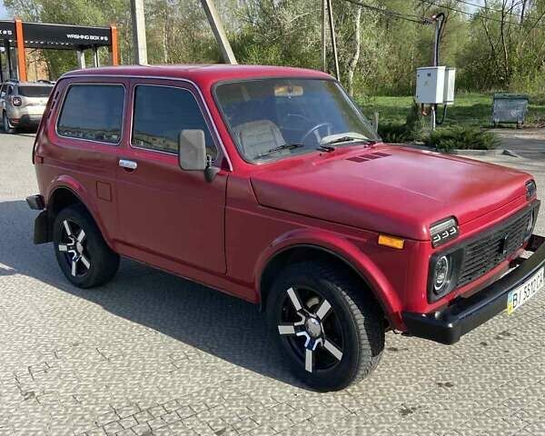 Красный ВАЗ 2121 Нива, объемом двигателя 1.57 л и пробегом 300 тыс. км за 2700 $, фото 1 на Automoto.ua