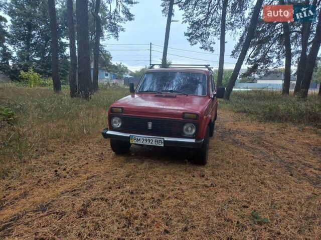 Красный ВАЗ 2121 Нива, объемом двигателя 1.58 л и пробегом 144 тыс. км за 1550 $, фото 1 на Automoto.ua