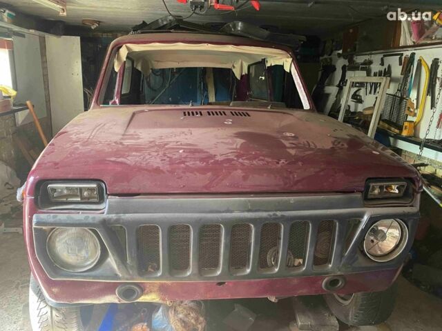 Красный ВАЗ 2121 Нива, объемом двигателя 0 л и пробегом 62 тыс. км за 1600 $, фото 1 на Automoto.ua