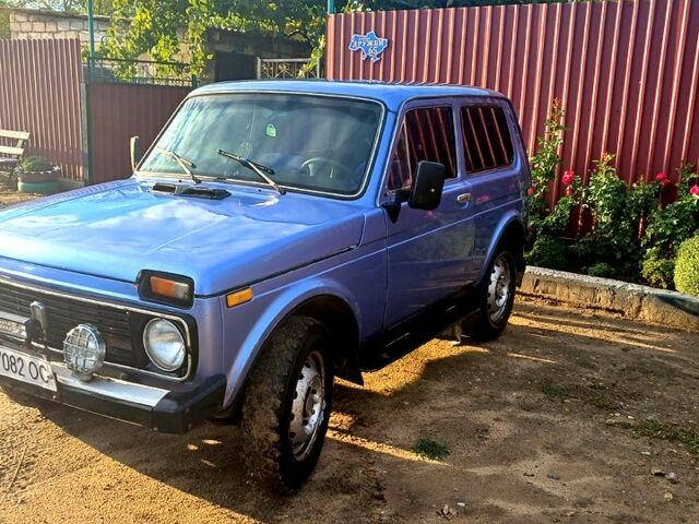 Синий ВАЗ 2121 Нива, объемом двигателя 1.6 л и пробегом 100 тыс. км за 2400 $, фото 1 на Automoto.ua