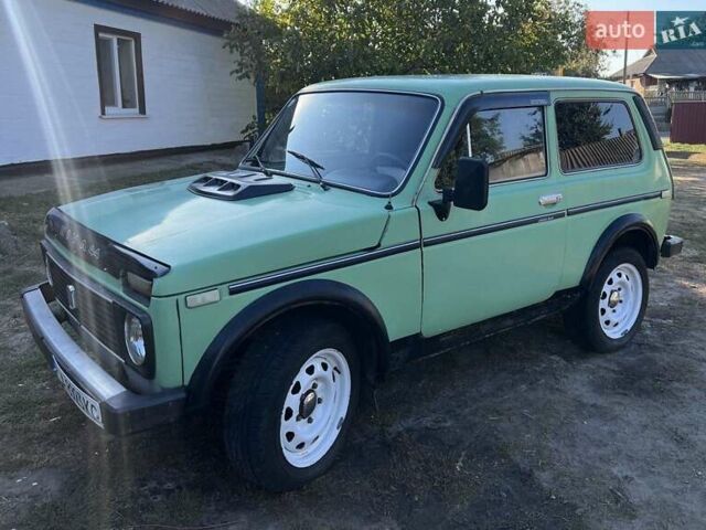 Зеленый ВАЗ 2121 Нива, объемом двигателя 1.6 л и пробегом 100 тыс. км за 1800 $, фото 1 на Automoto.ua