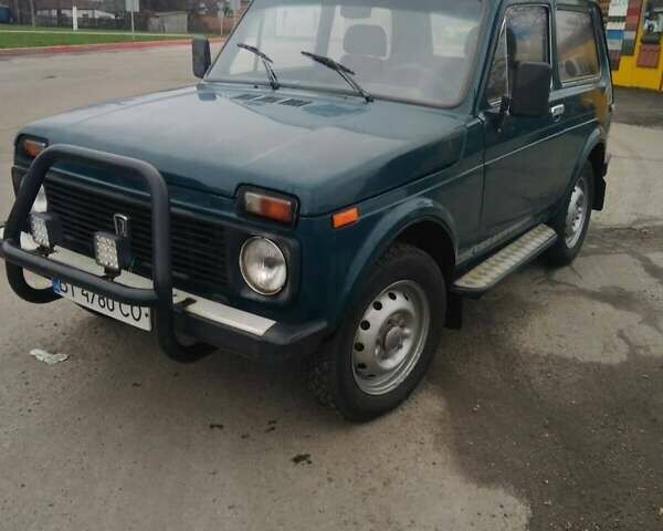 Зеленый ВАЗ 2121 Нива, объемом двигателя 1.57 л и пробегом 229 тыс. км за 4199 $, фото 1 на Automoto.ua