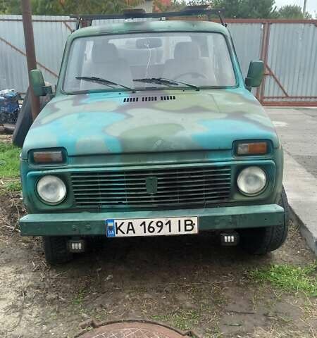 Зелений ВАЗ 2121 Нива, об'ємом двигуна 1.6 л та пробігом 144 тис. км за 1781 $, фото 1 на Automoto.ua